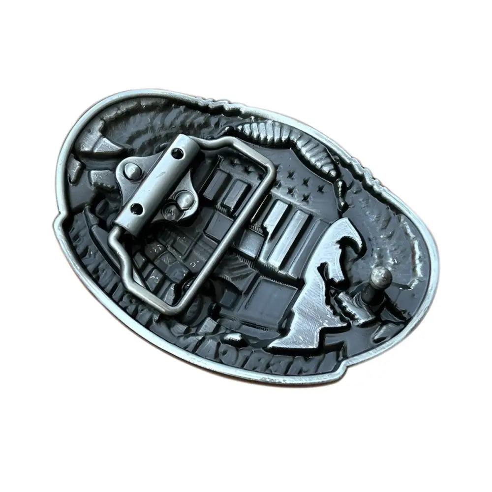 American Trucker belt buckle back showcasing durable metal design with truck-themed detail