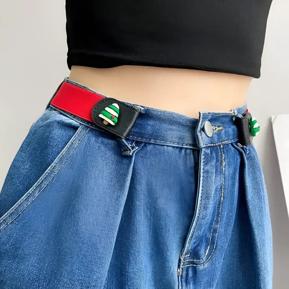 Apolline belt with red and black design and Christmas tree decorations featuring snowflakes and Santa Claus embellishments