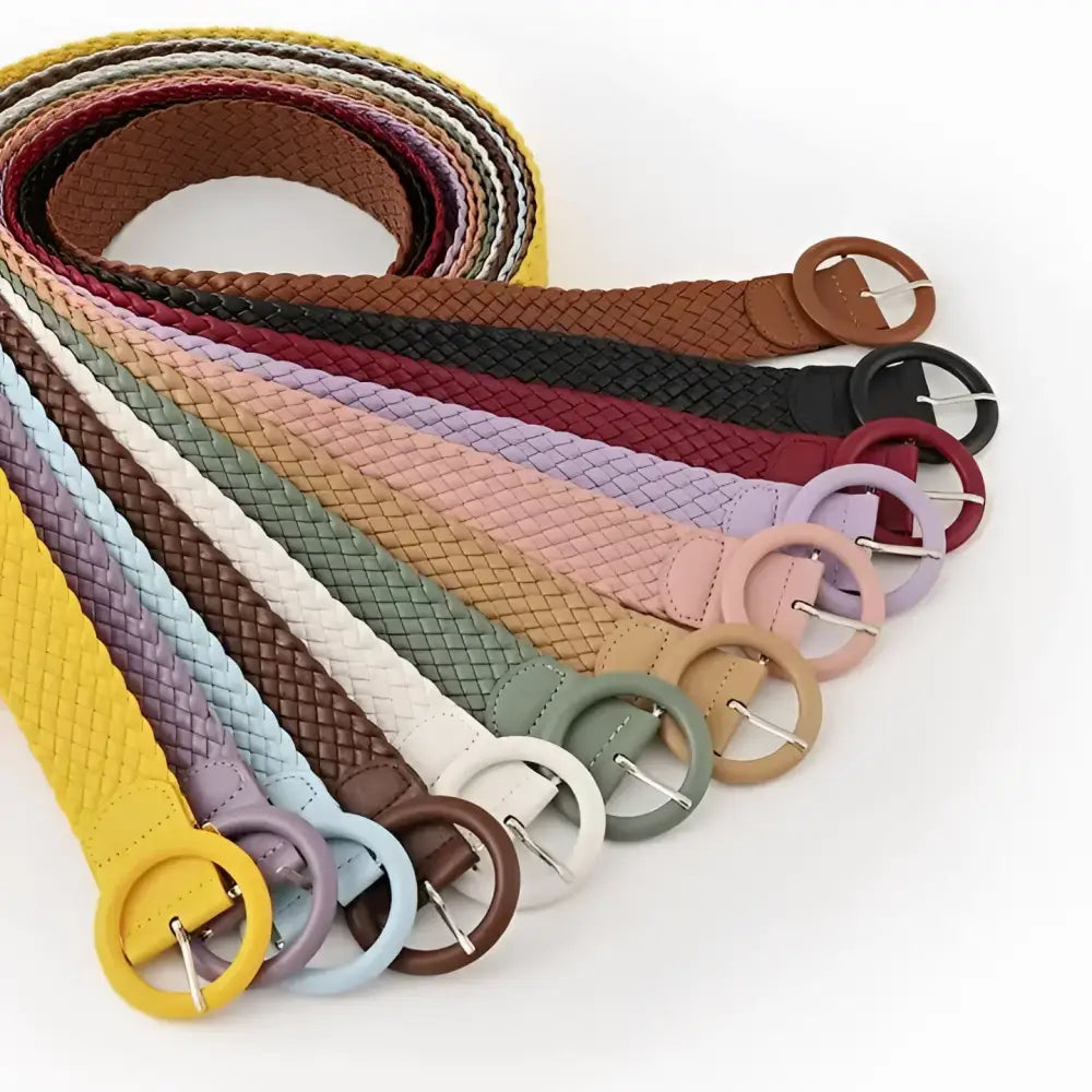Assorted braided belts with round buckles displayed for casual wear