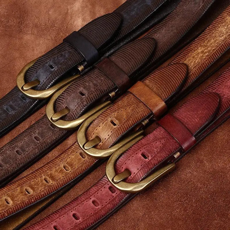 Assorted leather belts with brass buckles displayed in the product Assorted Leather Belts with Brass Buckles