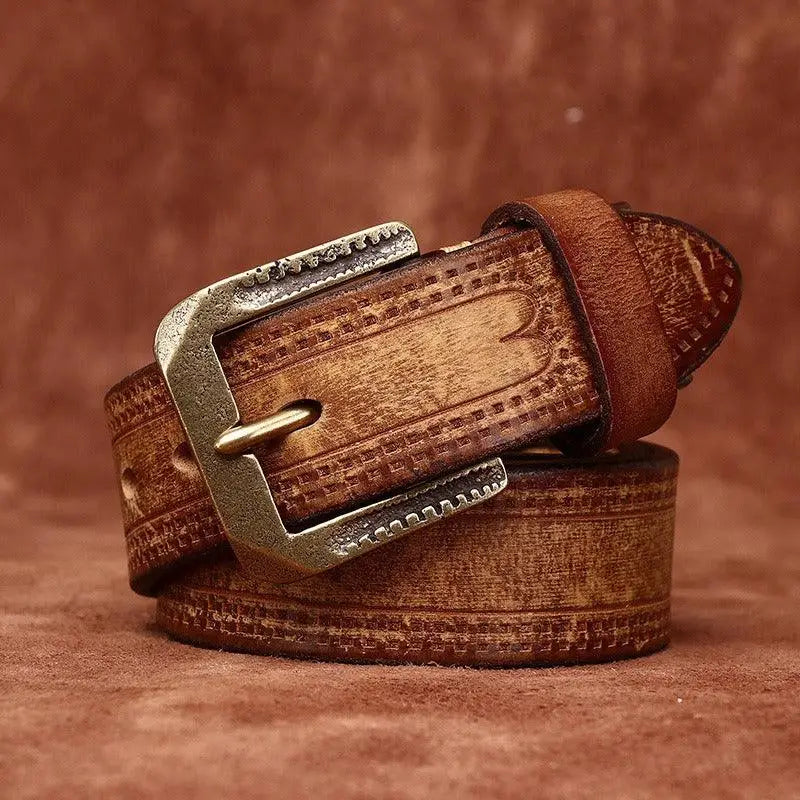 Embossed brown leather belt with metal buckle from Assorted Leather Belts with Brass Buckles