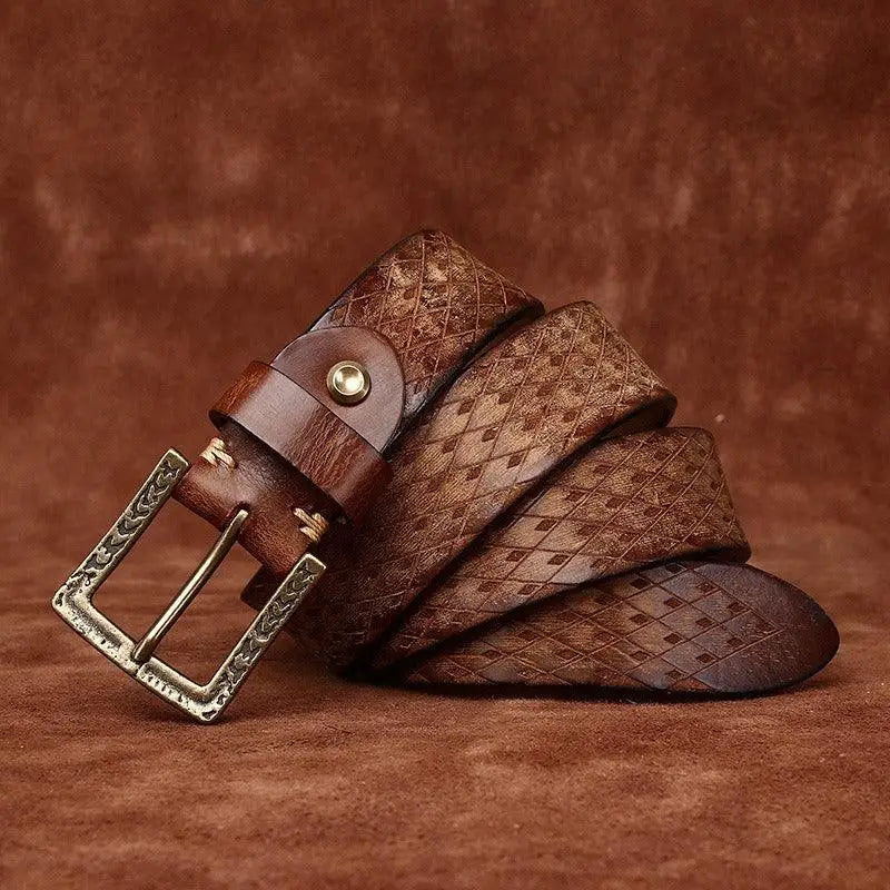 Brown leather belt with patterned design from Assorted Leather Belts with Brass Buckles