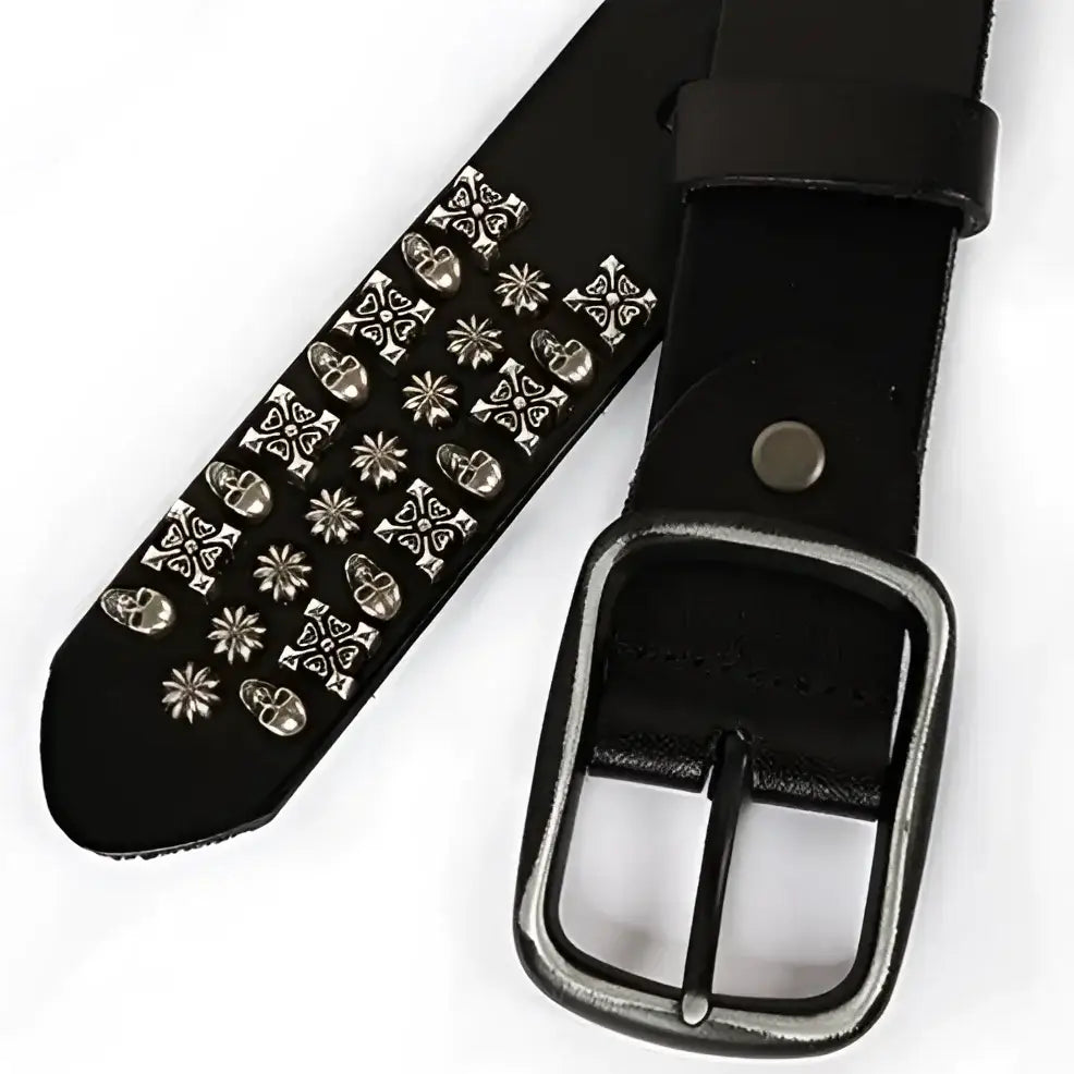 Black studded leather belt with silver skull and cross embellishments for a bold style