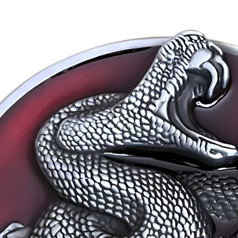 Silver snake belt buckle with red background for elegant style and high-quality craftsmanship