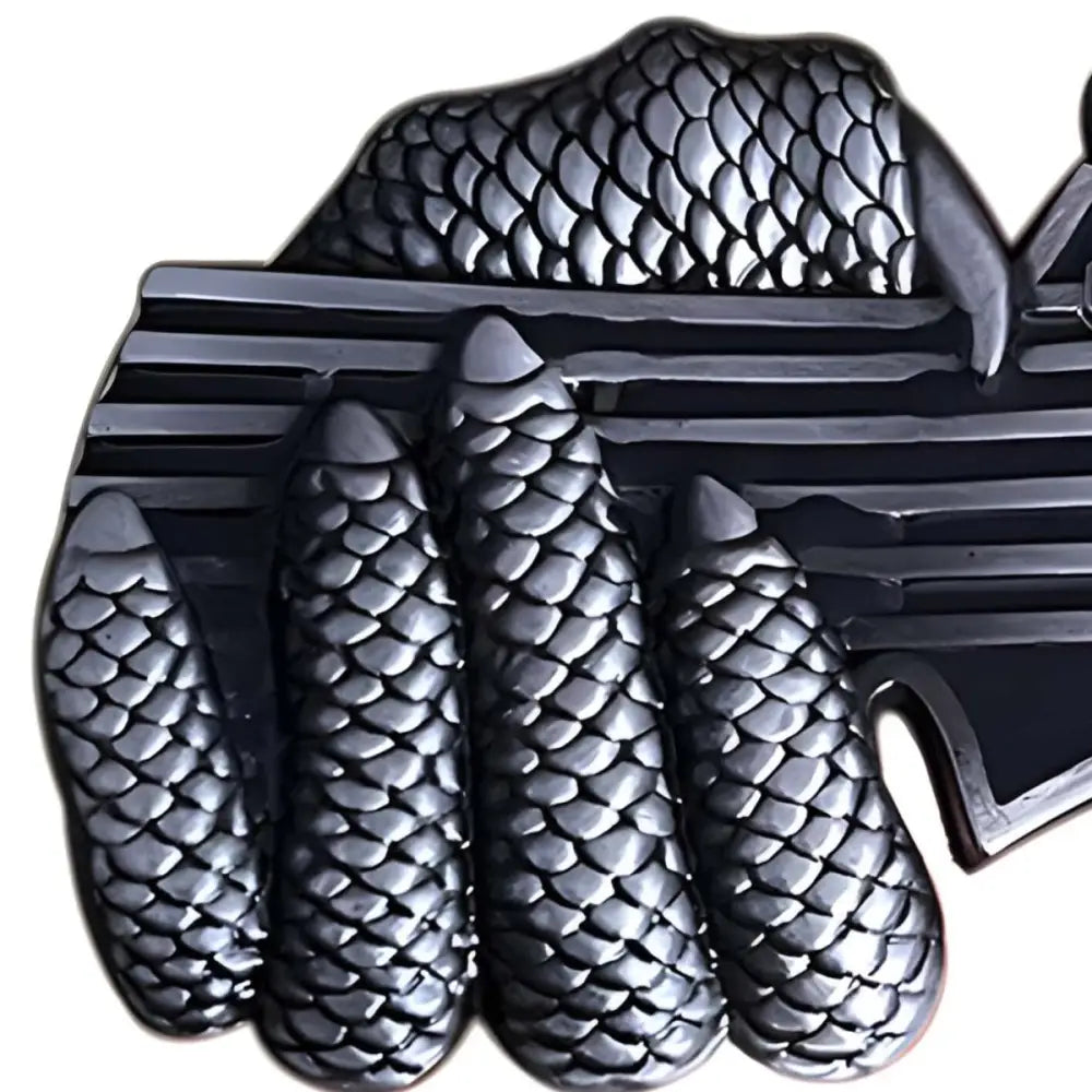Silver dragon claw gripping bars on an intricately designed head music belt buckle