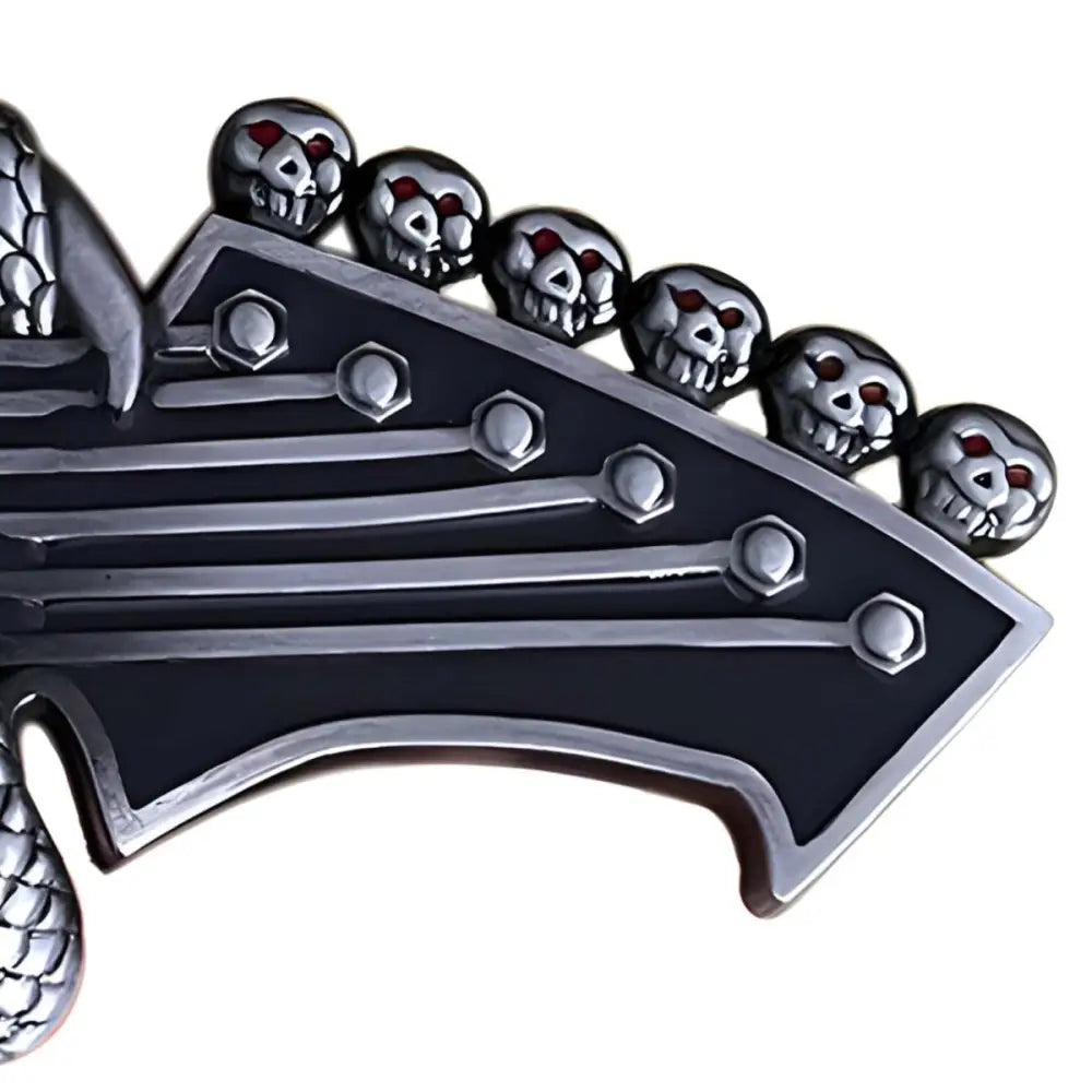 Silver Dragon Claw Guitar Head Music Belt Buckle with Skull Accents, featuring skull tuning pegs