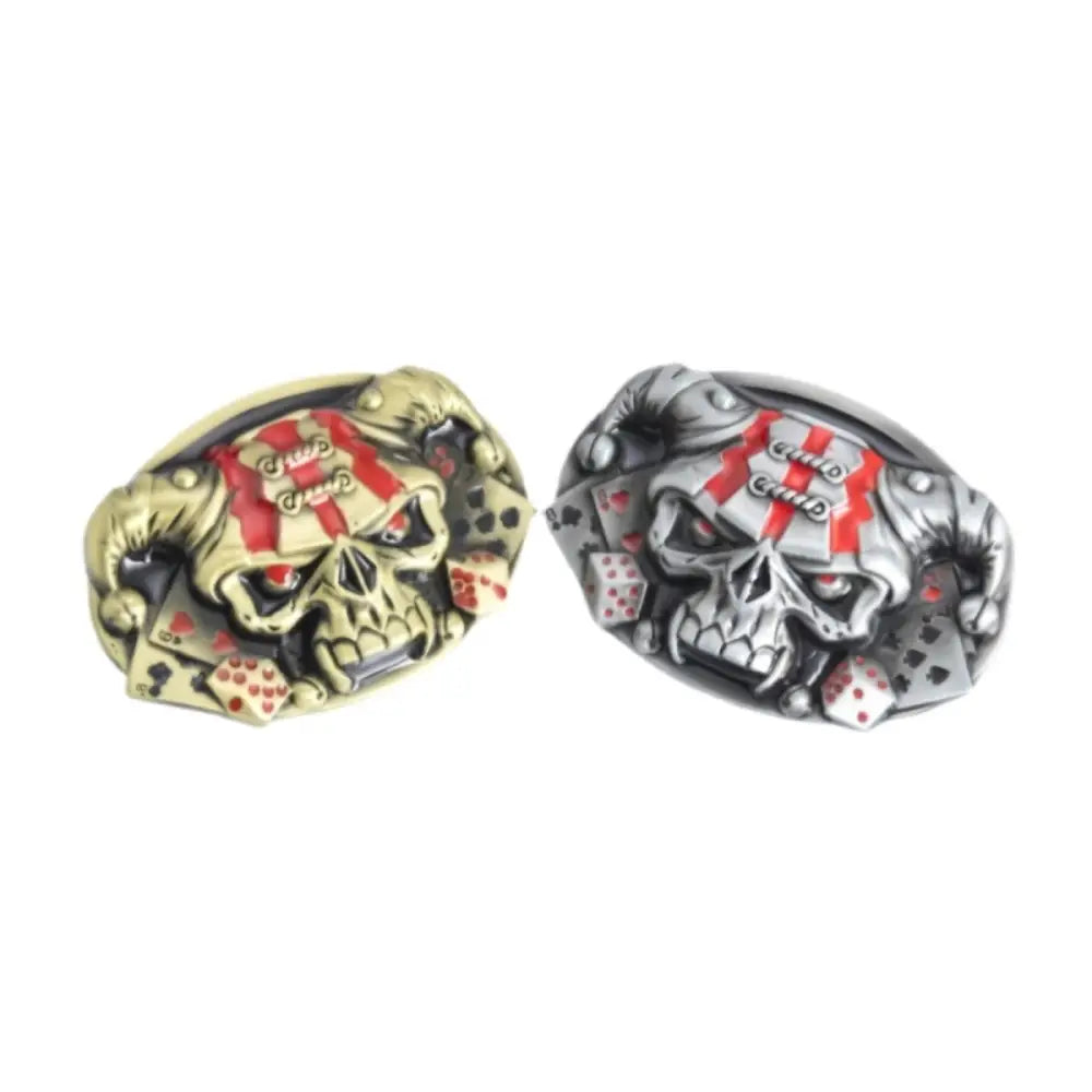 Two skull-themed belt buckles from the Murphy Skull Belt with Playing Cards and Dice Skull Belt Buckle collection