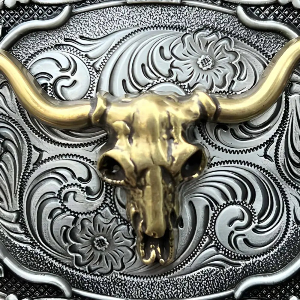 Ornate silver and gold bull skull belt buckle showcasing intricate craftsmanship