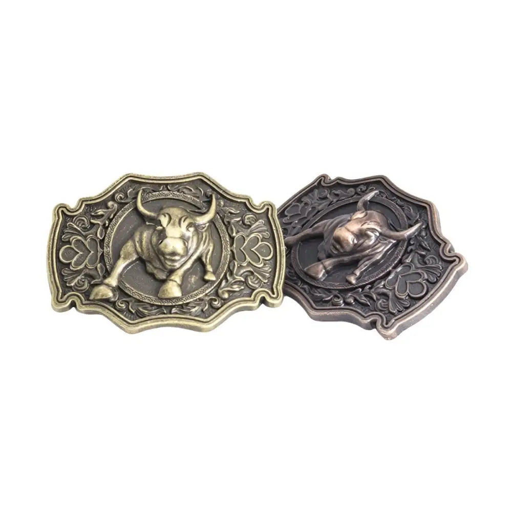Two ornate bull-themed belt buckles for Western and rustic style accessories