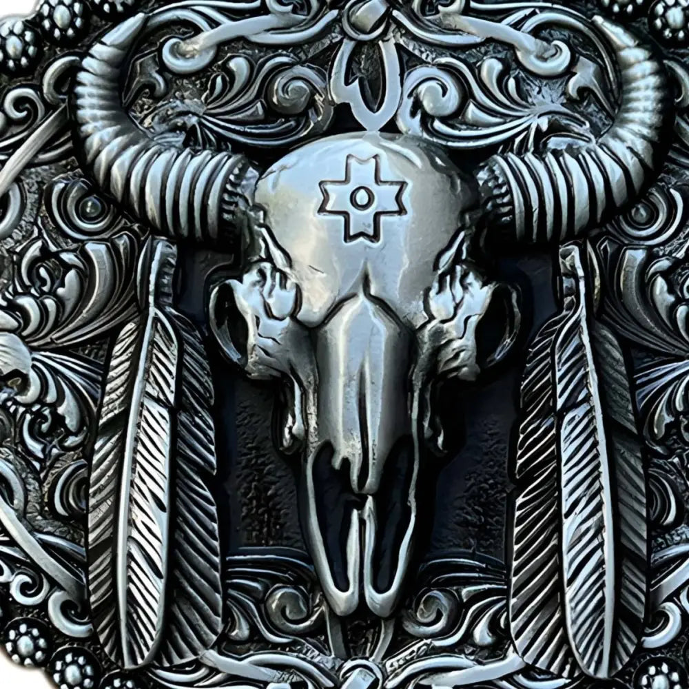Silver-toned ornate bull skull belt buckle with feather details for Western fashion