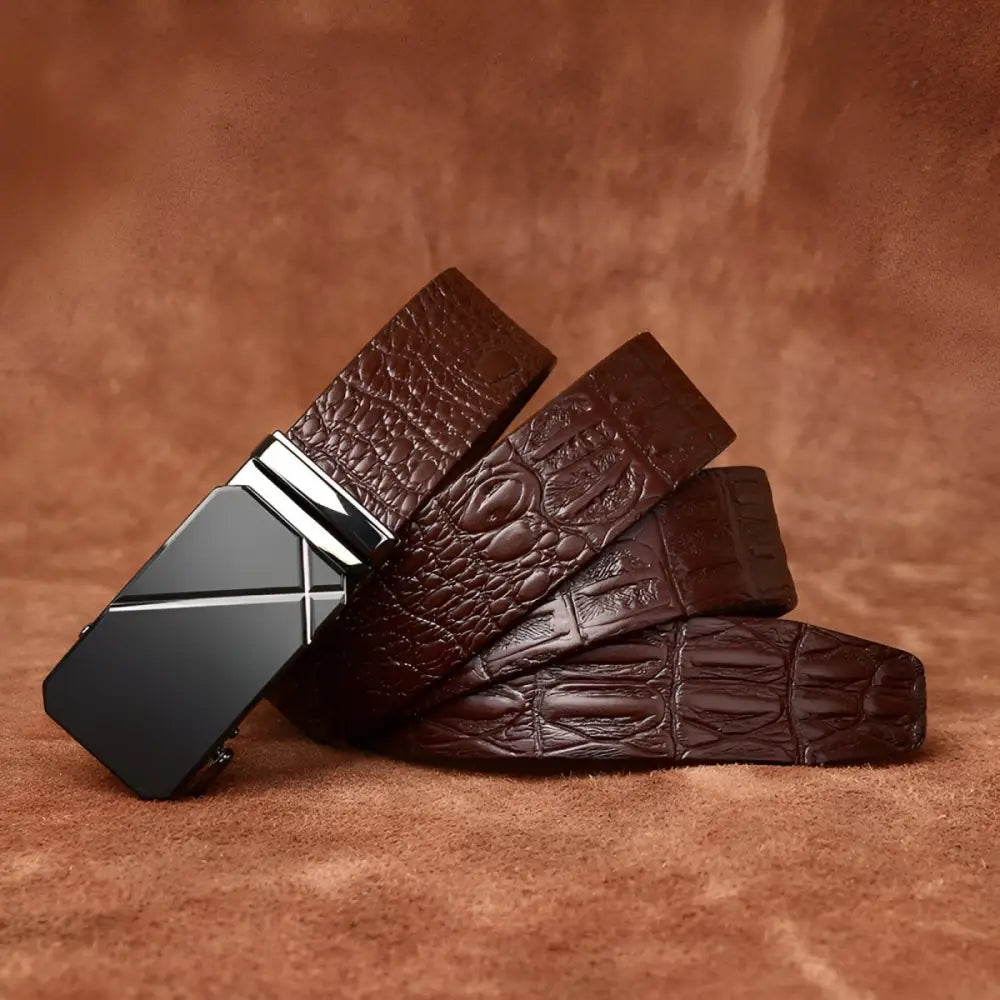 Brown crocodile-patterned leather belt with black and silver buckle for men’s fashion