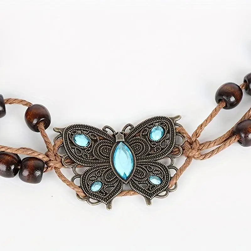Beaded belt with butterfly embellishment featuring waxed cotton for an elegant ara belt design