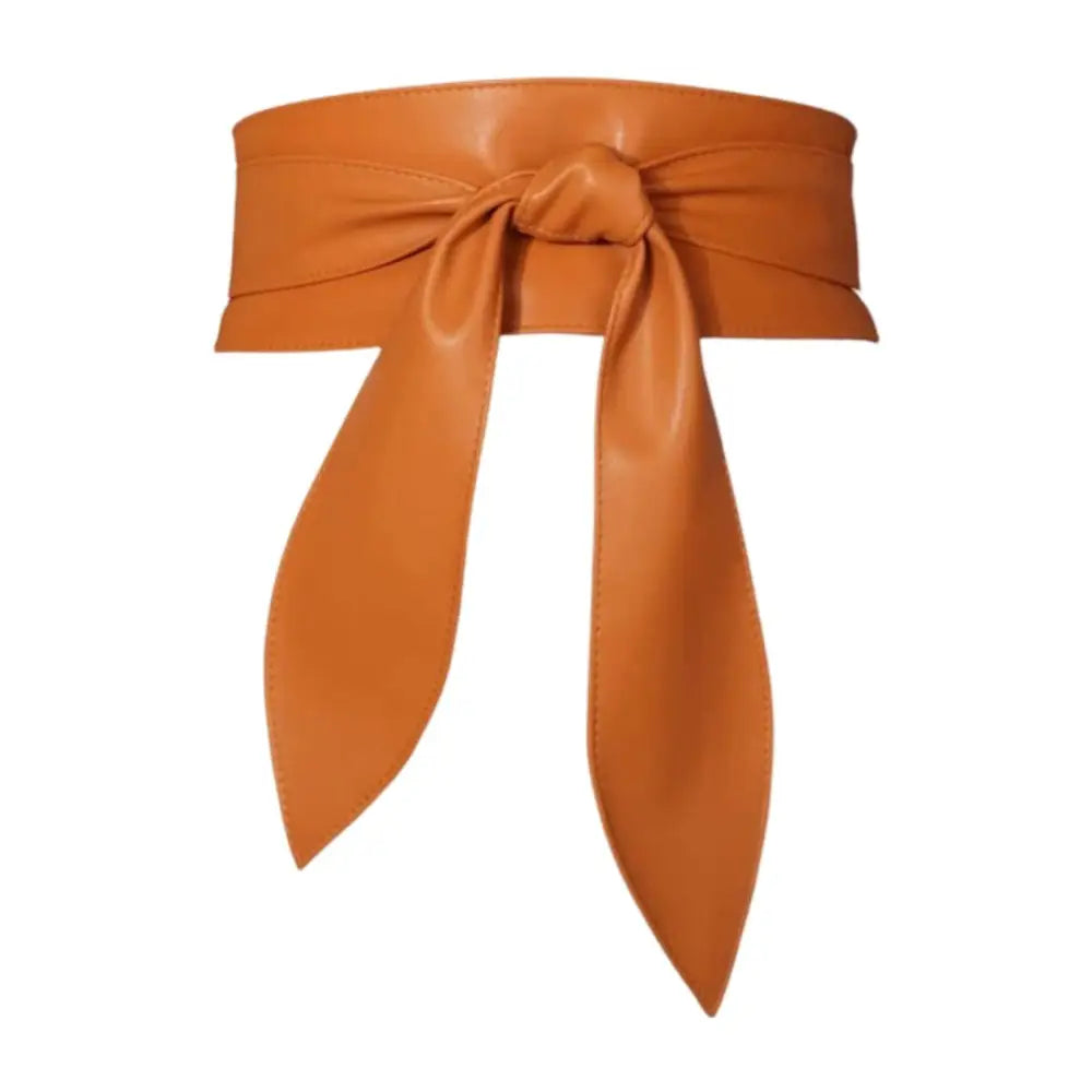 Orange leather obi belt displayed on Elly Belt in Brown and Black Leather for Elegant Style