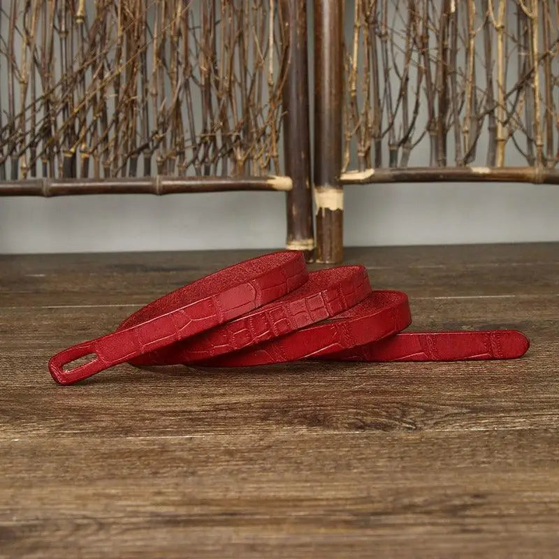Red faux crocodile leather straps for tie belt and belt ubredice accessory display