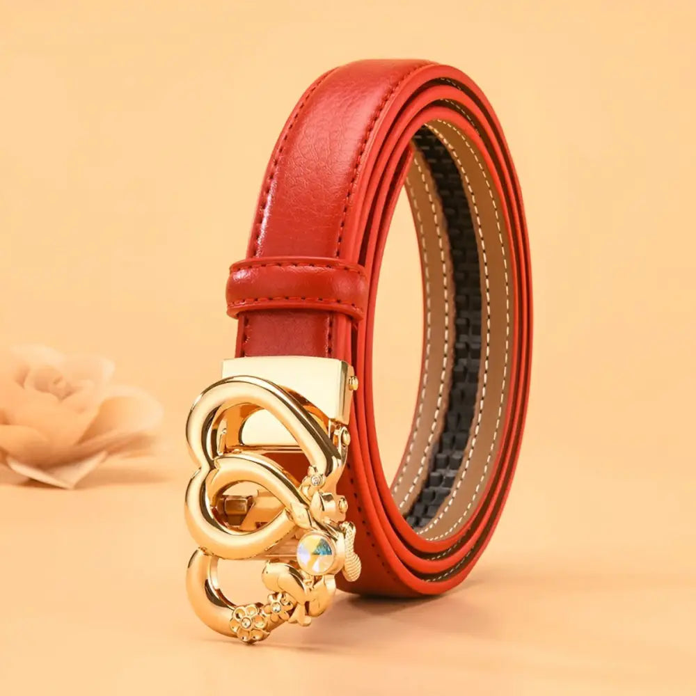 Automatic leather belt featuring a red leather strap with a gold heart-shaped buckle