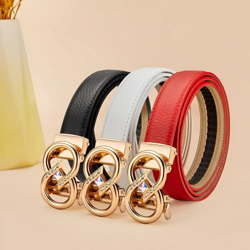 Set of three leather belts with gold buckles and rhinestone accents for stylish wear