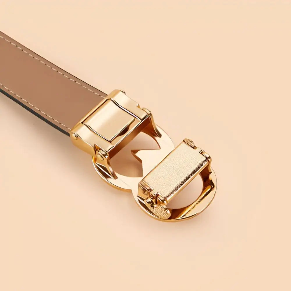 Gold-toned belt buckle with star cutout from Set of Leather Belts with Gold Buckles and Rhinestone Accents