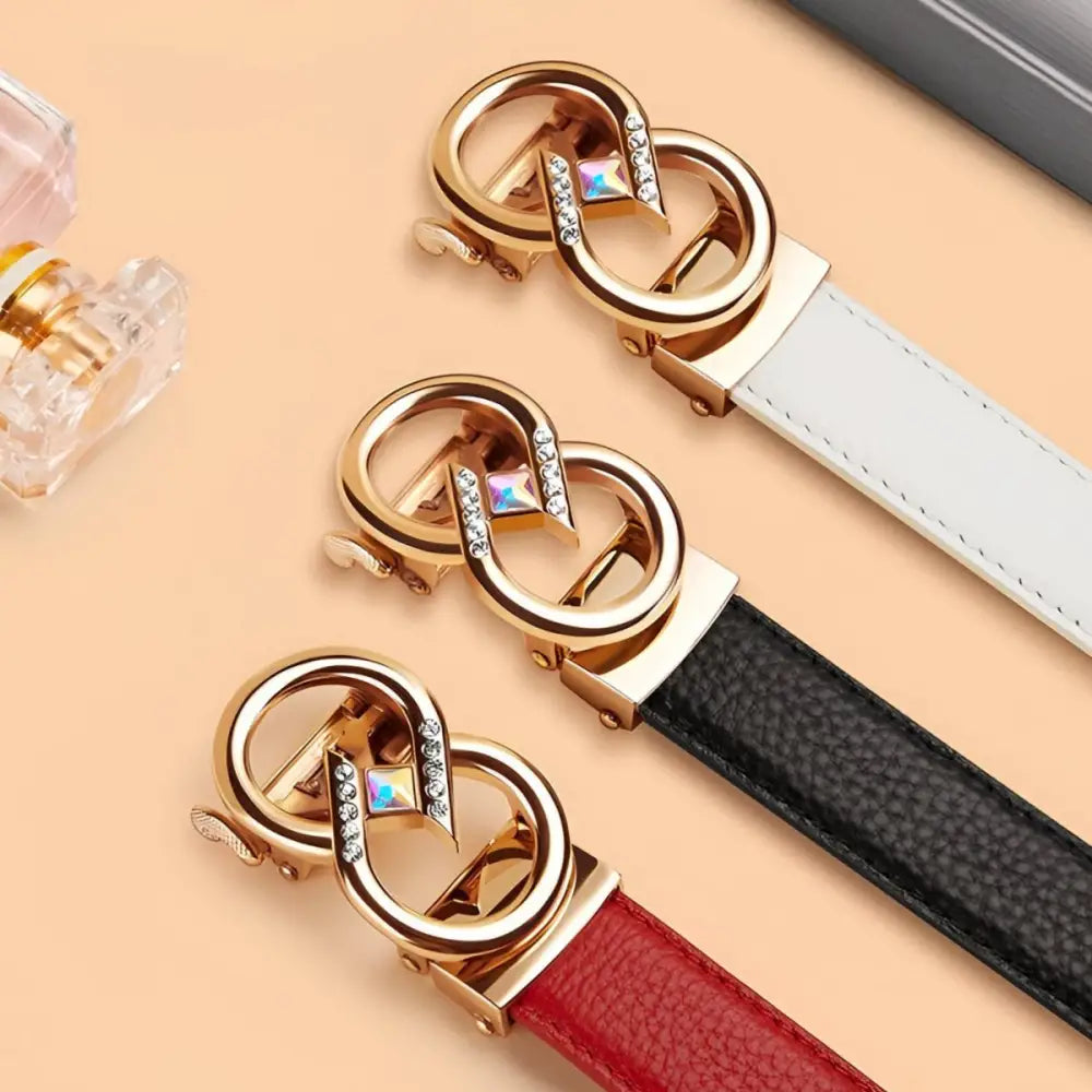 Set of leather belts with gold interlocking circle buckles and rhinestone accents