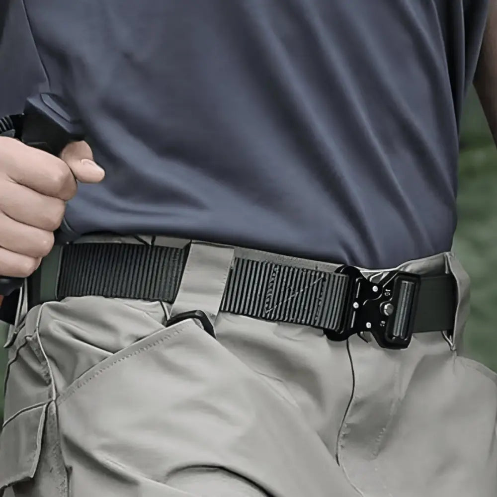 Tan tactical belt with black metal buckle suitable for outdoor and tactical use
