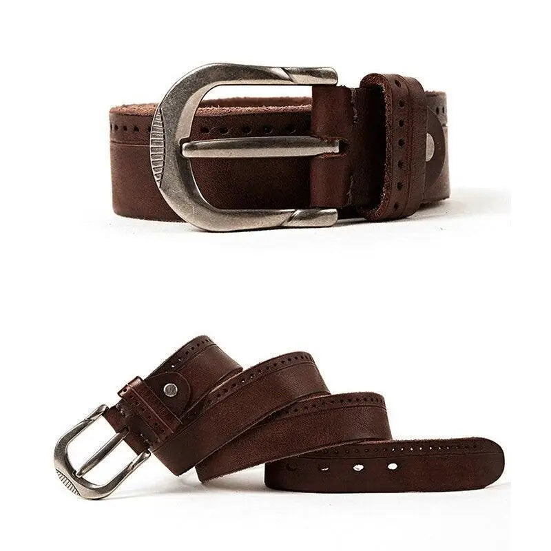 Brown leather belt with silver buckle paired with Ripped Blue Jeans