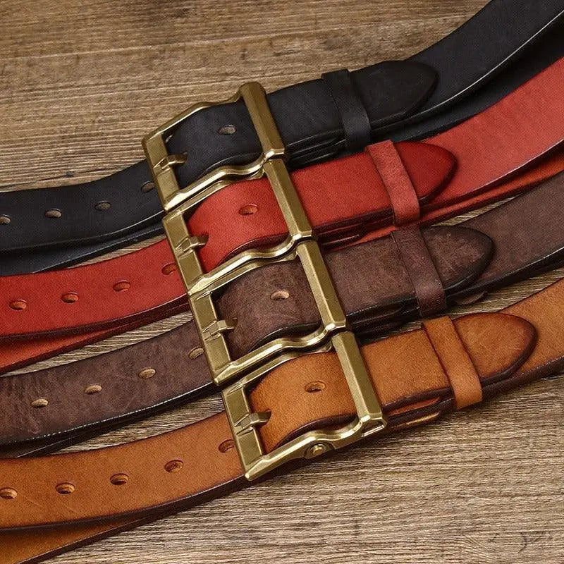 Assorted leather belts with brass buckles displayed in the product Assorted Leather Belts with Brass Buckles