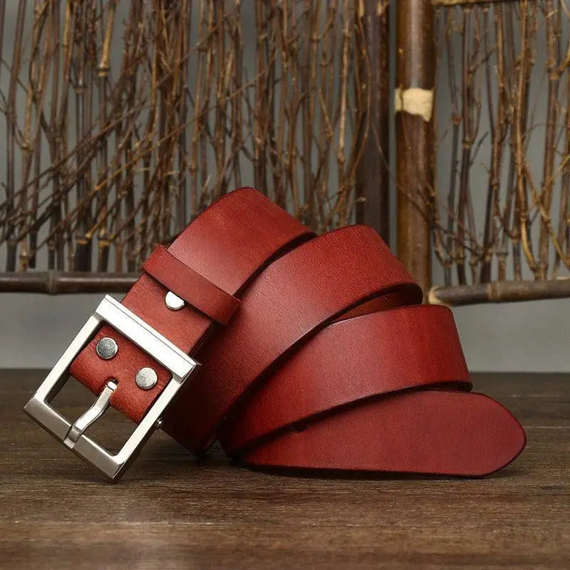 Red leather belt with silver buckle from Assorted Leather Belts with Brass Buckles