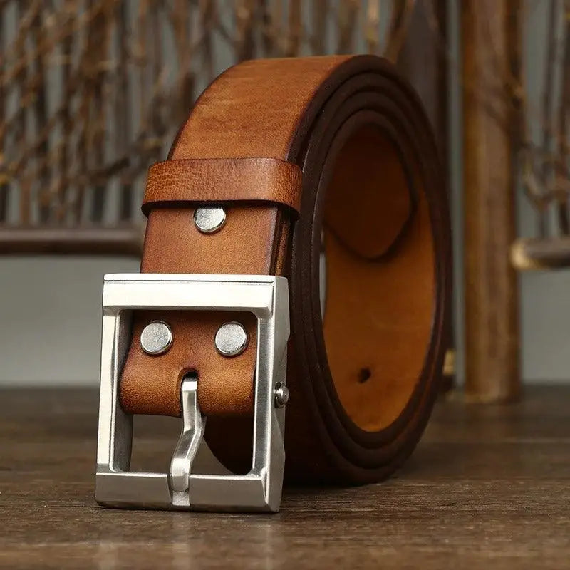 Brown leather belt with a silver buckle from Assorted Leather Belts with Brass Buckles