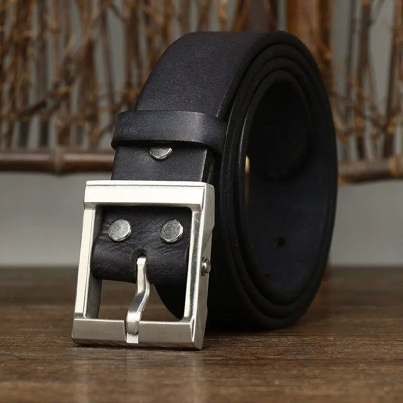 Black leather belt with a silver buckle from Assorted Leather Belts with Brass Buckles