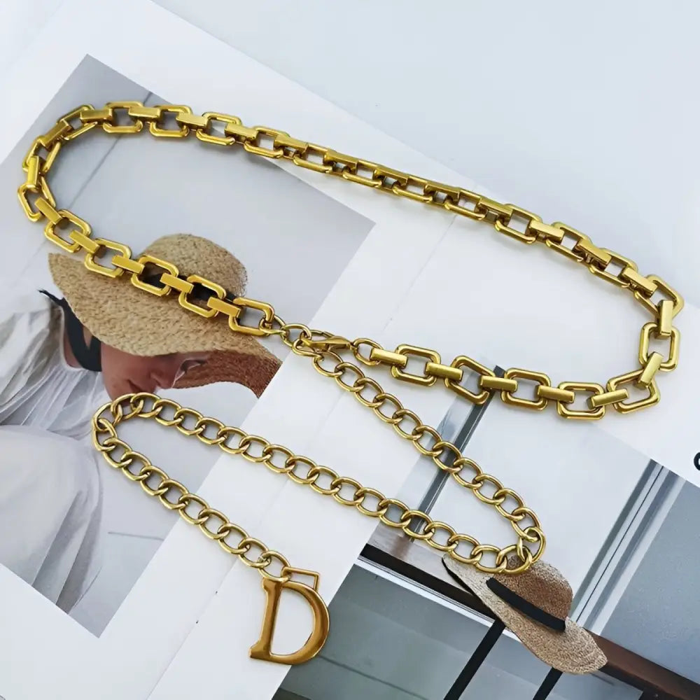 Gold-toned anasenko chain belt with D charm for stylish black outfits