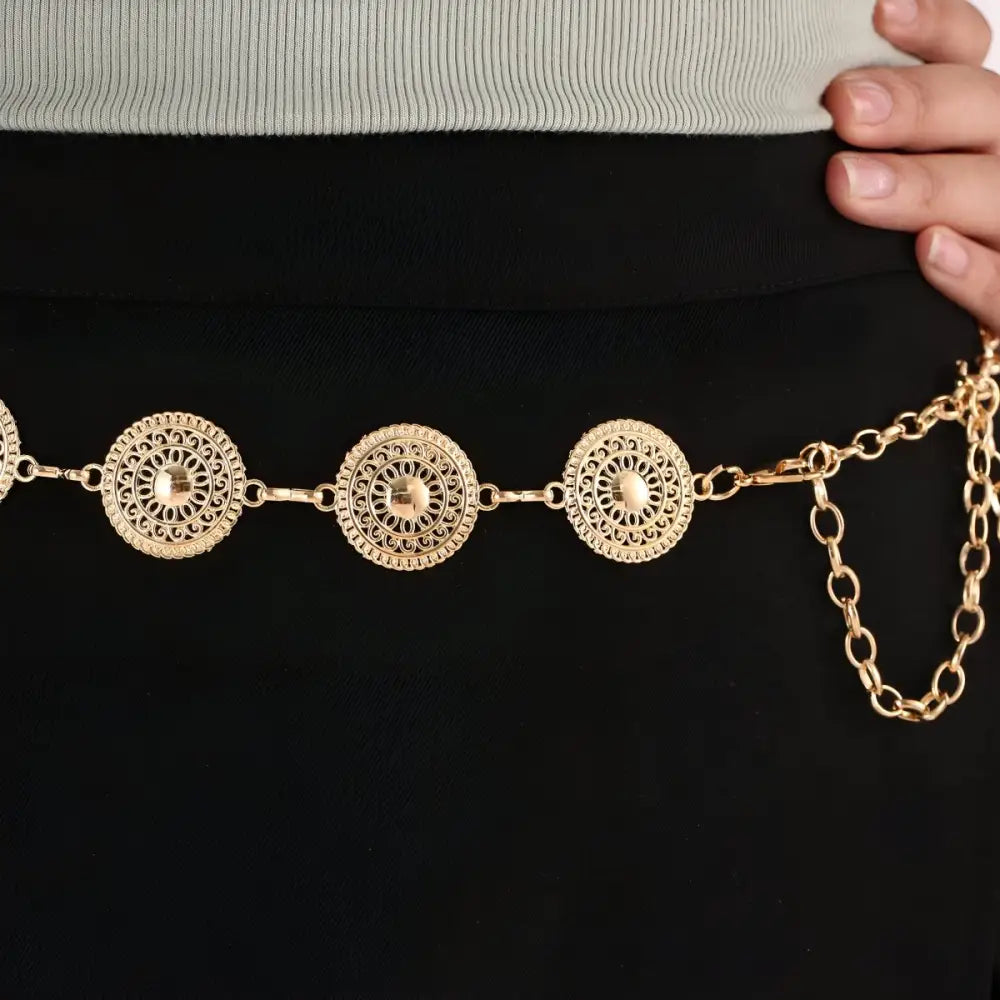 Gold-toned filigree disc belt enhancing the aesthetic appeal of the Orya chain belt