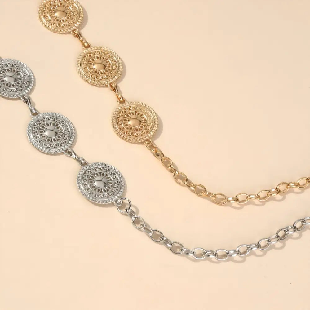 Silver Orya Chain Belt with Circular Medallions showcasing gold and silver decorative chains for aesthetic appeal