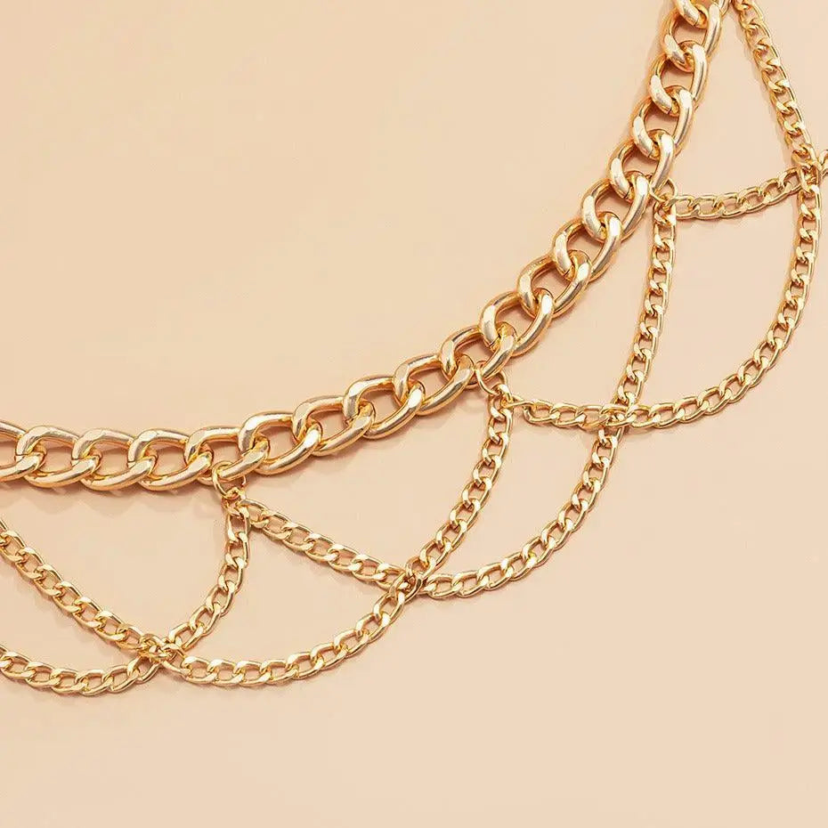 Gold-toned Pulledia women’s chain belt with cascading strands for personal style
