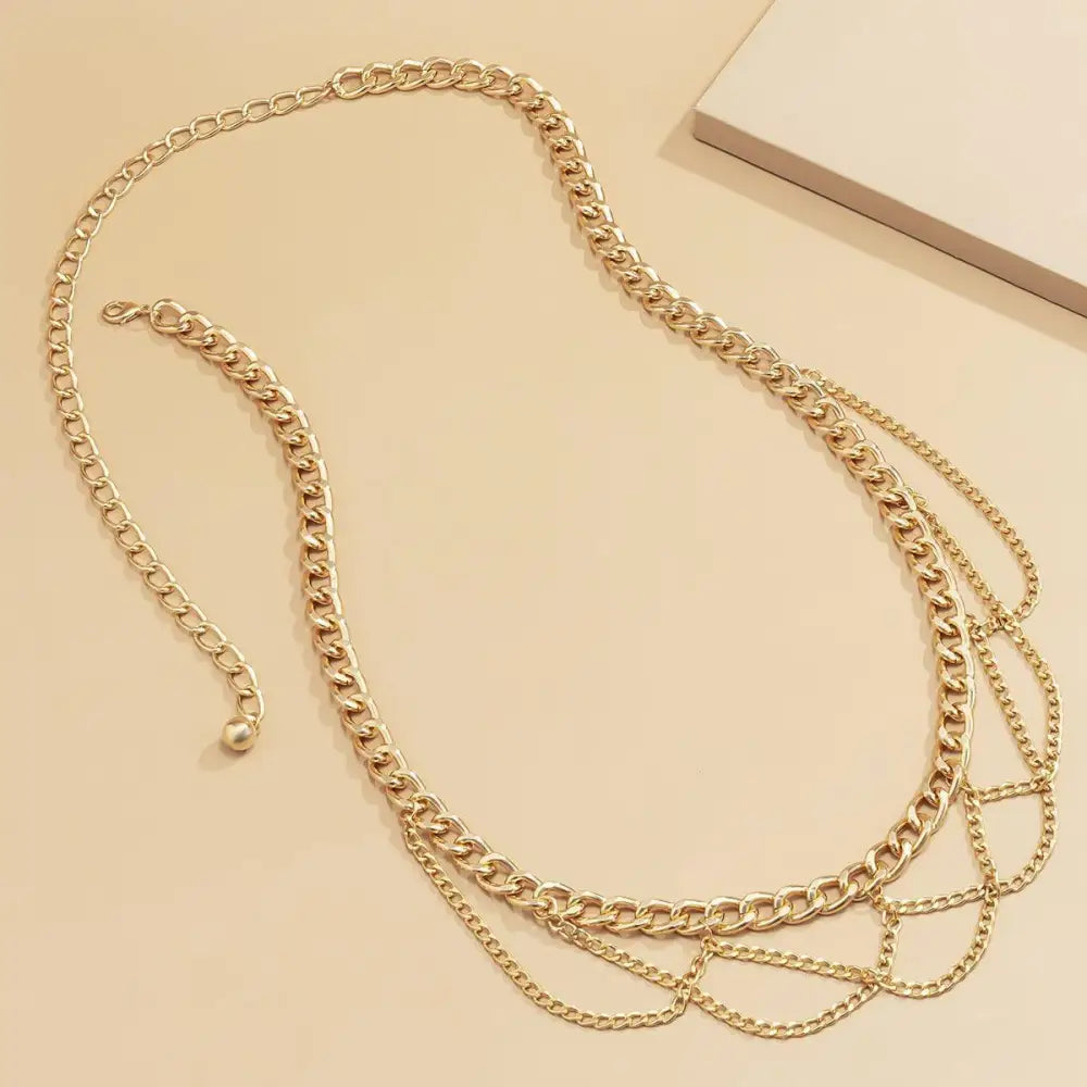 Gold-toned layered chain belt from Pulledia Women’s Chain collection for personal style