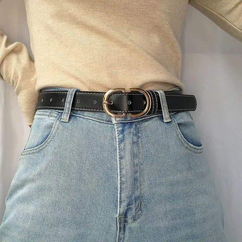 Black leather belt featuring a gold buckle for a sophisticated accessory look
