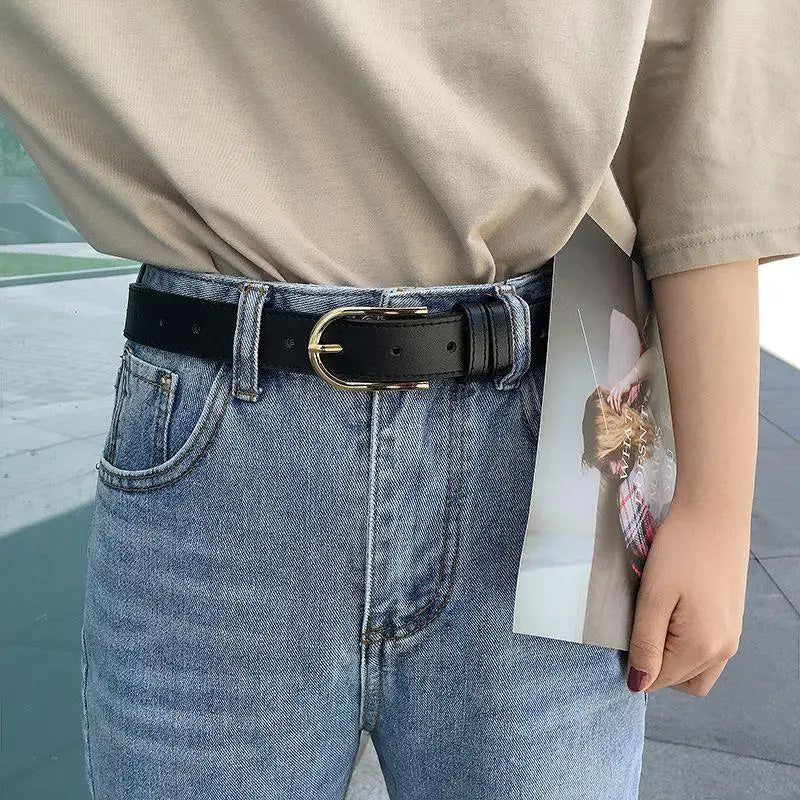 Charlotte Belt in black leather with gold buckle, stylish accessory for men and women