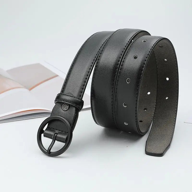 Black leather belt featuring a round buckle for stylish and durable wear