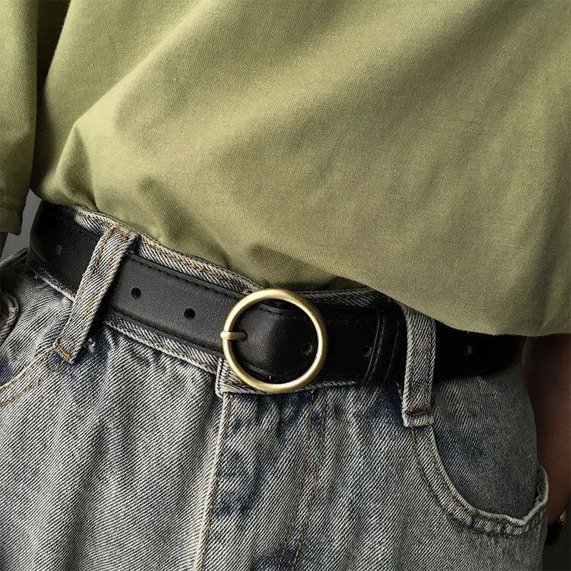Black leather belt featuring a gold round ring buckle for a stylish accessory