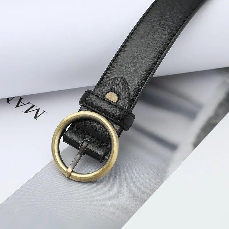 Black leather belt with a gold round brass buckle suitable for formal wear