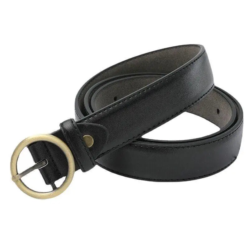 Black leather belt featuring a round gold buckle for stylish accessories