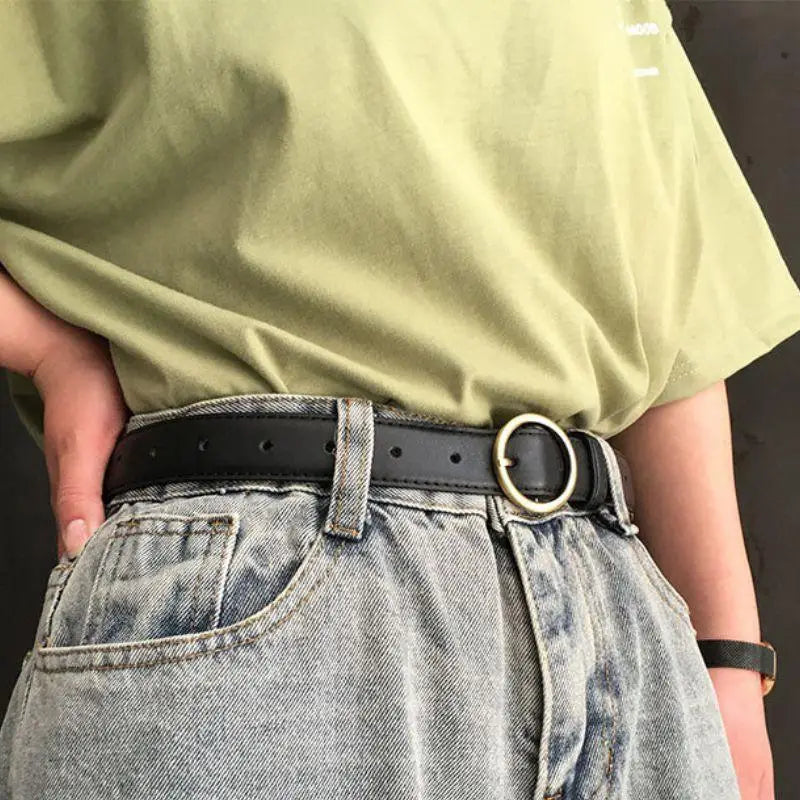 Black Leather Belt with Gold Round Buckle featuring a black belt and circular buckle design