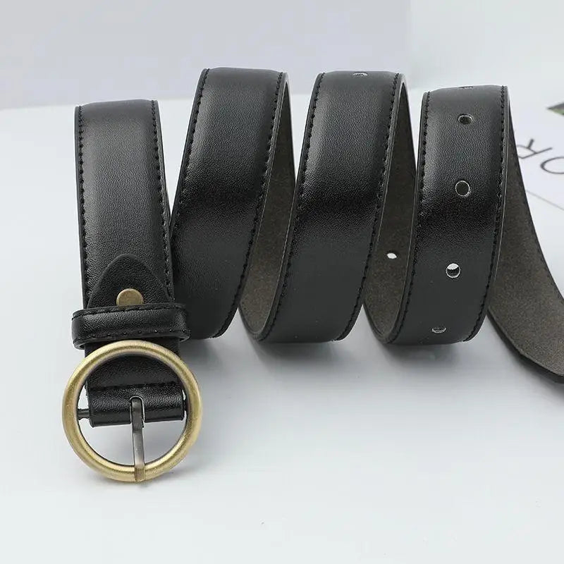 Black leather belt featuring a gold round buckle for a stylish and elegant look