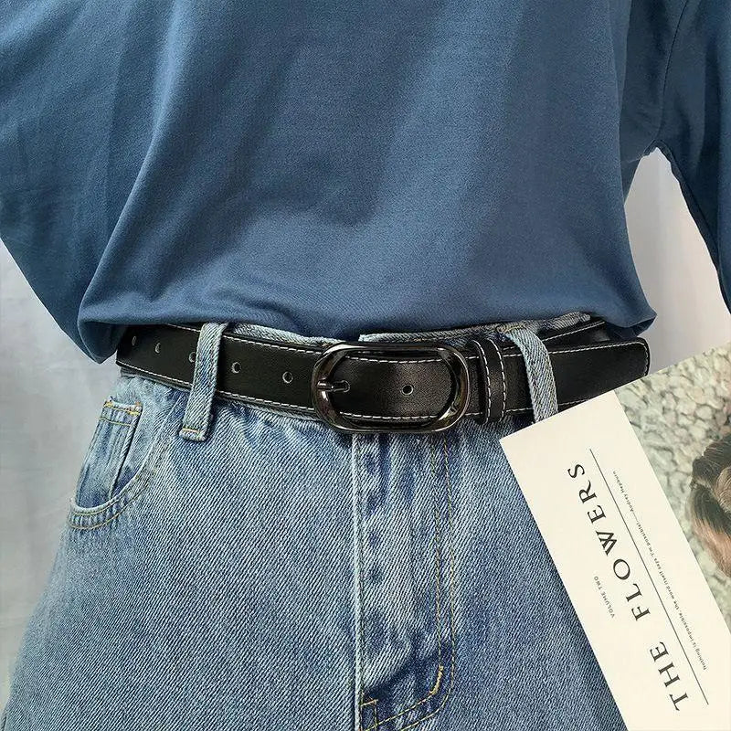 Black leather belt with a silver buckle, ideal for stylish and formal wear