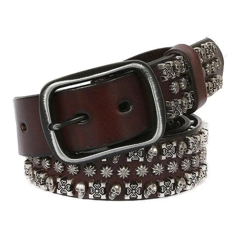 Brown leather belt with silver skull and cross stud embellishments for stylish accessorizing