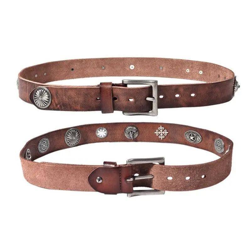 Aged Leather Belts with Silver Conchos and Studded Detailing showing two brown leather belts