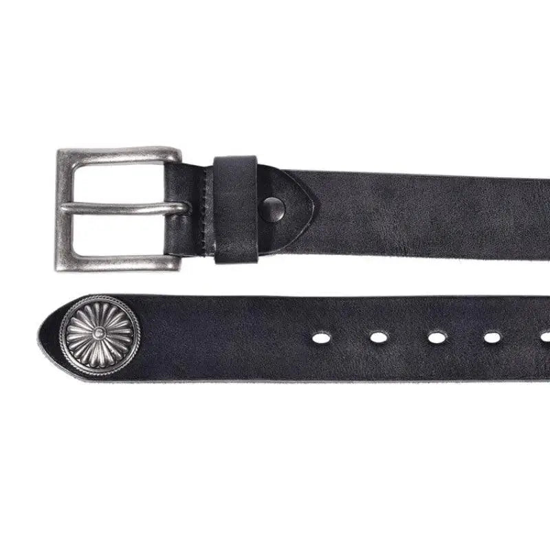 Aged leather belt with silver buckle and conchos, featuring studded detailing