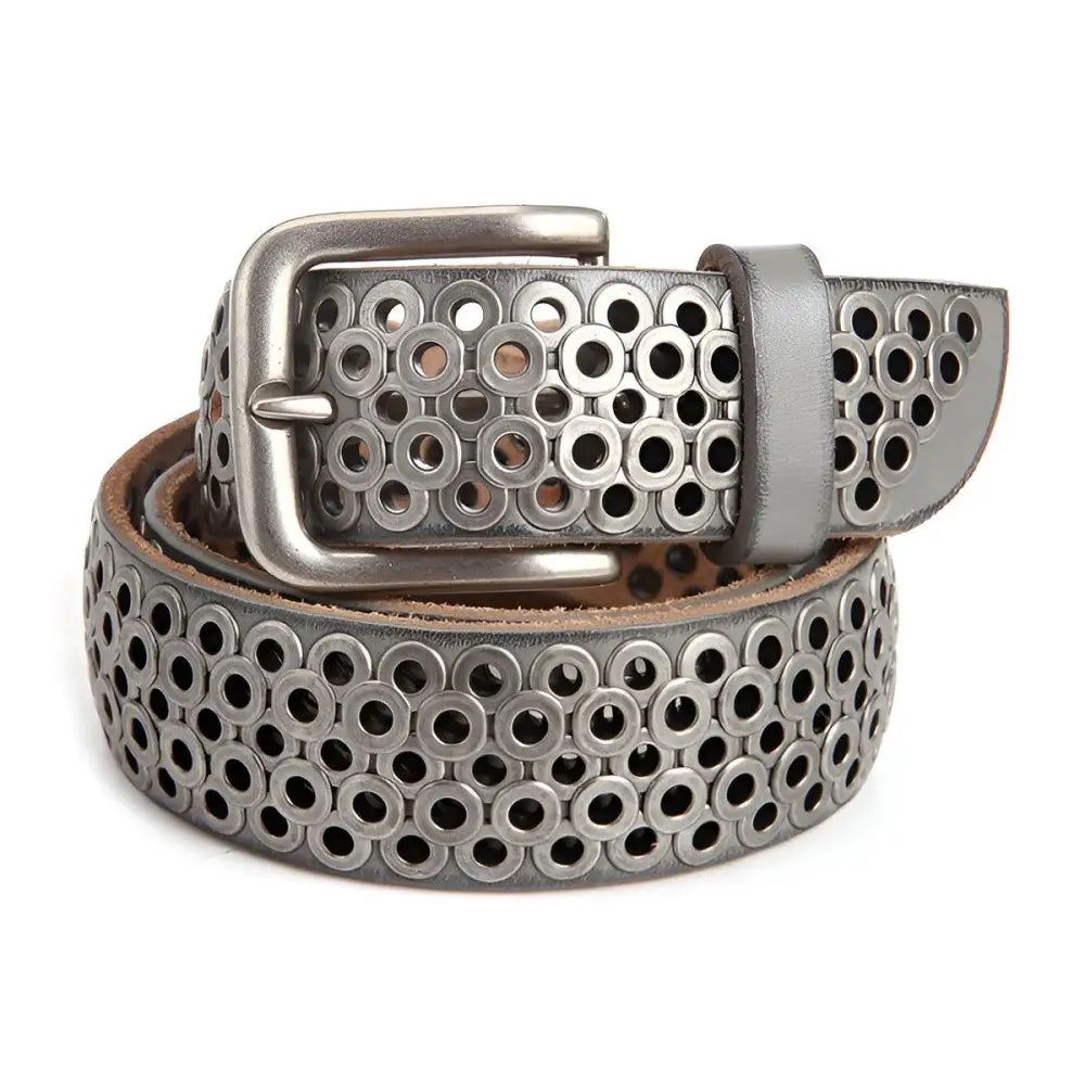 Silver leather belt with circular cutouts, metal rings, and buckle featured in product