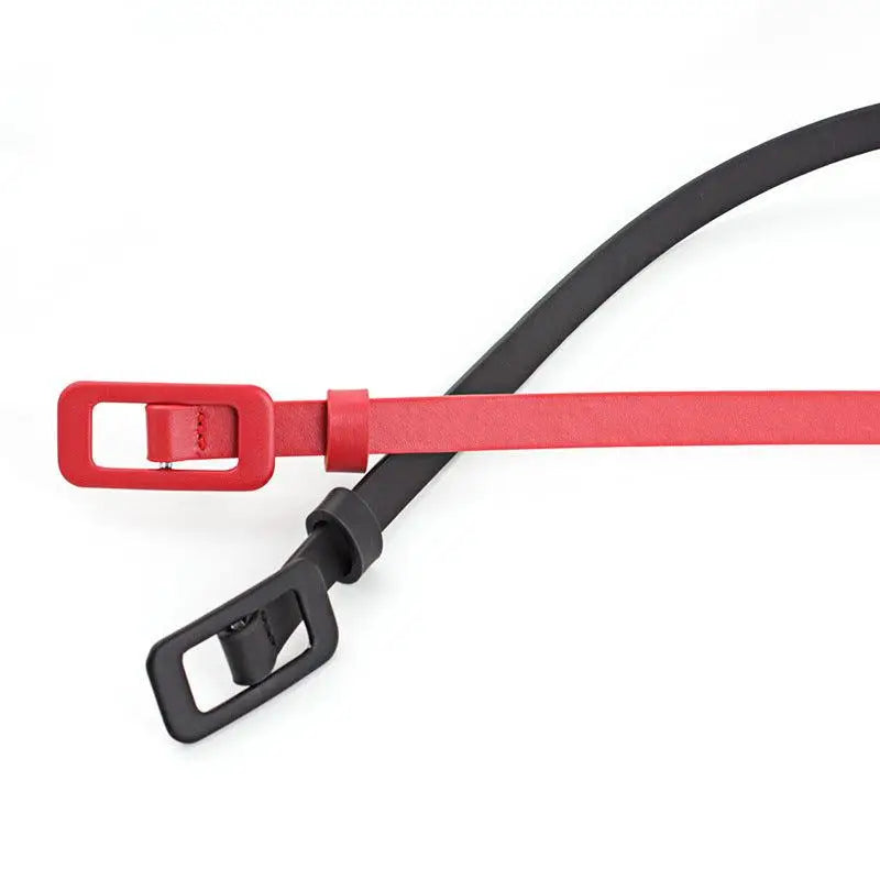 Airoro belt set featuring red and black skinny leather and faux leather belts