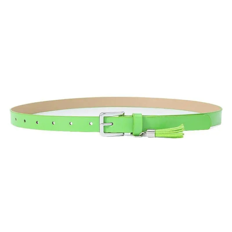 Lime green women’s belt with silver buckle and tassels, stylish patent leather accessory