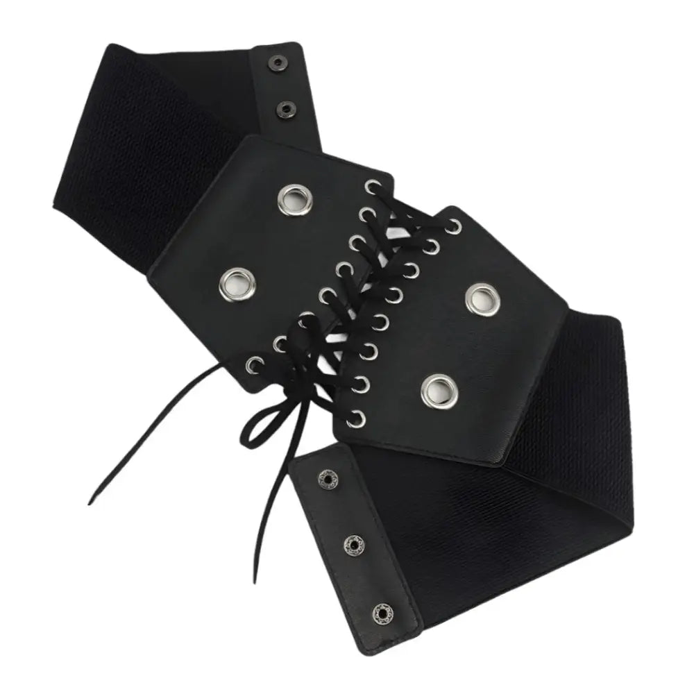 Black corset belt with silver grommets for stylish waist accent and fashion statement