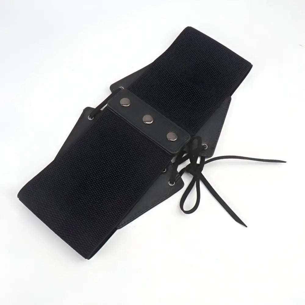 Black elastic corset belt with silver grommets for stylish waist accents